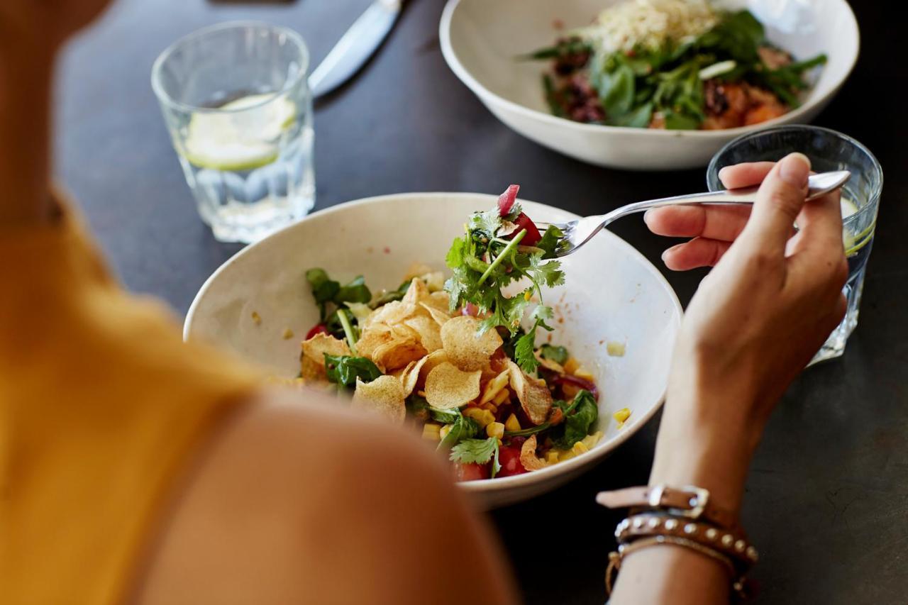 Hyatt Place Jaipur Malviya Nagar Exterior photo A woman eating a salad
